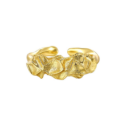 Wrapping Paper Textured Gold Ring, crafted from 18K gold-plated sterling silver. This ring features a unique wrapping paper textured design.  Immerse yourself in the spirit of holidays and the joy of receiving a gift with this exquisite accessory. Symbolizing the warmth of friendship and the art of giving, wear this ring as a reminder of the special moments shared with loved ones. 